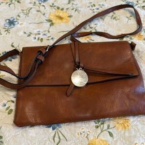 Simple, leather brown Crossbody bag.